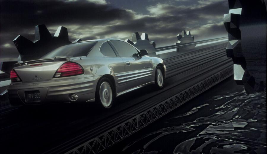  Pontiac Grand Am 1999 года  (фото 9 из 21)